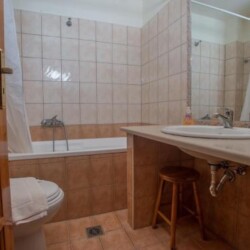 Bathroom with bathtub at Sunset Holiday Home, Neo Kalamaki
